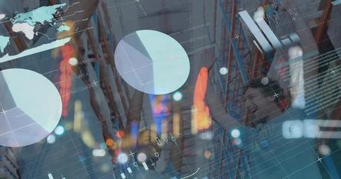 Image of graphs and data over happy diverse female and male warehouse workers Stock Photos