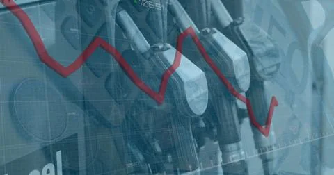 Image of graphs and data processing over fuel pumps at garage Foto stock