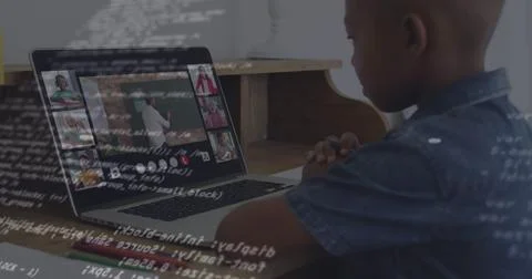 Image of graphs and data processing over african american boy having online Foto stock