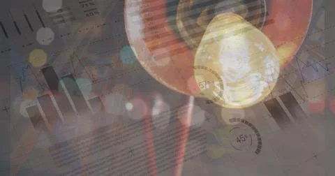 Image of graphs and financial data over warehouse light イラスト素材