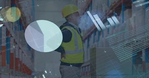 Image of graphs and financial data over caucasian male warehouse worker Stock Photos