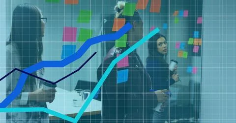 Image of graphs and grid pattern over diverse coworkers discussing strategy on Stock Photos