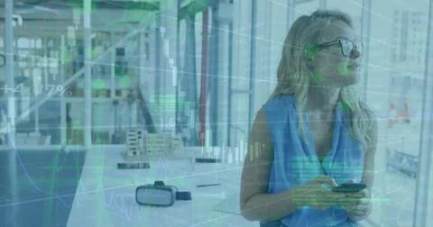 Image of graphs, computer language on caucasian woman using cellphone and 스톡 사진