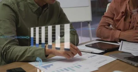Image of graphs, globe, computer language over diverse colleagues analyzing Stock Photos