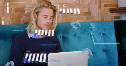 Image of graphs, globes and computer language, caucasian man working on lapto Stock Photos