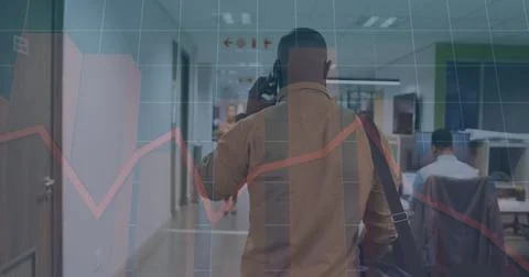 Image of graphs, grid pattern, african american man talking on cellphone while Stock Photos