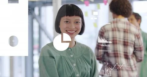 Image of graphs, map, flowchart, cloud in laptop over smiling biracial woman 写真素材