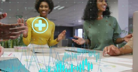 Image of graphs, numbers, icons, diverse coworkers discussing and putting hands 库存照片