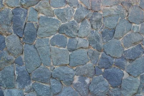 The image is a gray stone wall as background Foto stock