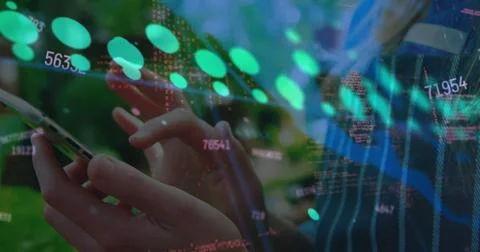 Image of green dot graph and data processing over hands of woman using 写真素材