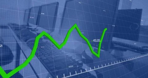 Image of green line and data processing over computers on desks in office Stock Photos