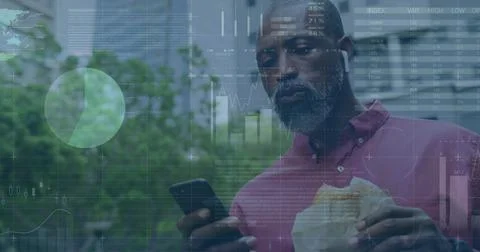 Image of green lines financial data processing over african american man on Stock Photos