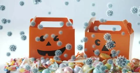 Image of halloween smiley face orange boxes with multiple cells floating on w Stock Photos