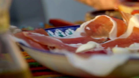 Image of a hand cooking a plate of bread with tomato garlic oil salt and Stock Footage 158723499