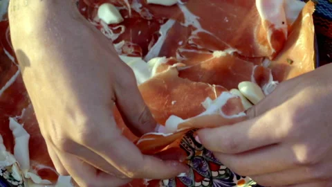 Image of a hand cooking a plate of bread with tomato garlic oil salt and Stock Footage 158724114