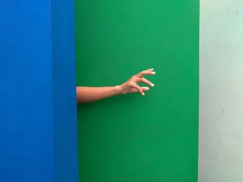 An image of a hand extending outward, as though seeking assistance Stock Photos