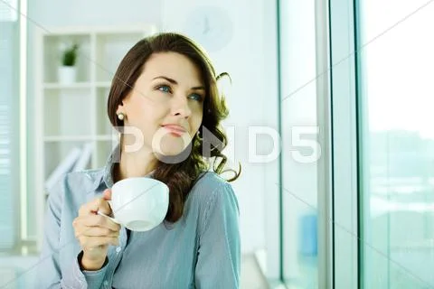Image of a happy business woman enjoying the coffee-break Stock Photos