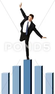 Image of happy businessman standing on top of the highest chart column Stock Photos