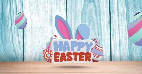 Image of happy easter text with easter bunny ears and easter eggs on blue wooden Stock Photos
