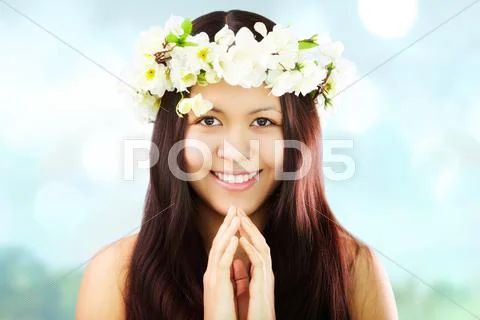 Image of happy female wearing floral wreath on head Stock Photos