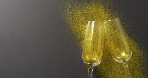 Image of happy new year text over champagne glasses Stock Illustration