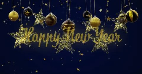 Image of happy new year text with baubles and stars hanging on blue backgroun Stock Photos