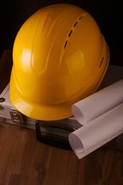 Image of hard hat on table Stock Photos