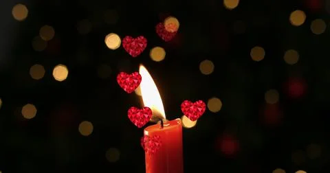 Image of hearts over spots and candle Ilustração Stock