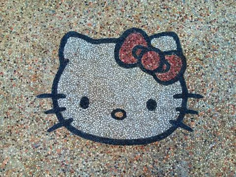 Image hello kitty on garden stepping stones. Foto stock