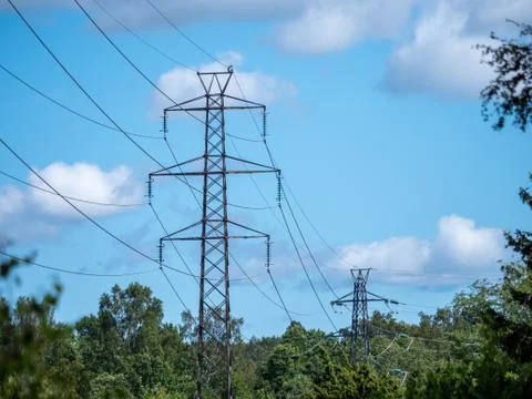 Image of High-voltage power lines. Electricity distribution station. Stock Photos