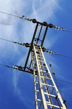 Image of high voltage tower with the sky in the background Stock Photos