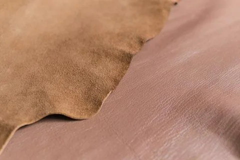 Image that highlights the refined elegance of a smooth, brown leather surface Foto stock