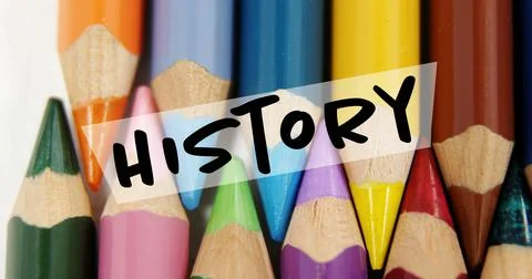Image of history text over crayons on white background Ilustración de archivo