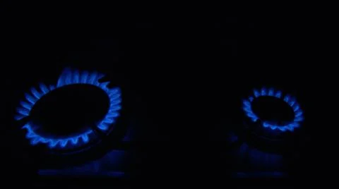 Image of a hob with one to four methane gas burners on Stock Photos