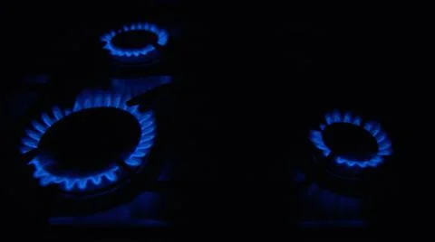 Image of a hob with one to four methane gas burners on Stock Photos