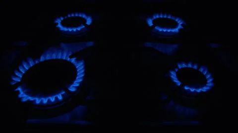 Image of a hob with one to four methane gas burners on Stock Photos