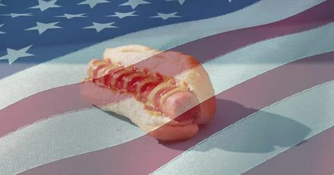 Image of hot dog over flag of usa Ilustración de archivo