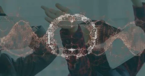 Image of human brain and dna strand over business people wearing vr headsets Stock Photos