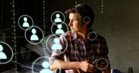 Image of icons and data processing over caucasian man using smartphone Foto stock