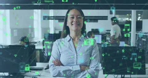 Image of icons and data processing over asian businesswoman in office Stock Photos