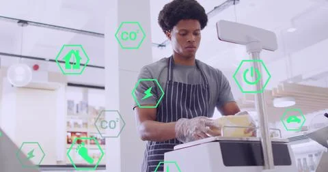 Image of icons and data processing over biracial man serving food in shop 스톡 사진