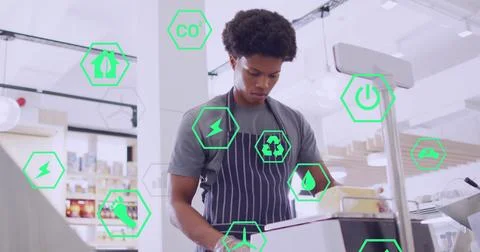 Image of icons and data processing over biracial man serving food in shop 스톡 사진