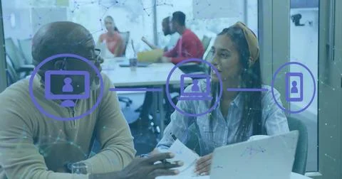 Image of icons and data processing over diverse business people Foto stock