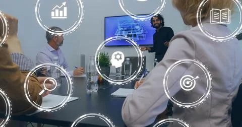 Image of icons and data processing over diverse business people in office Foto stock