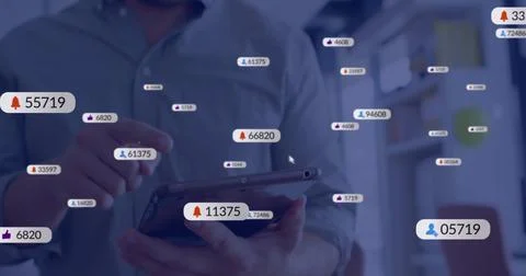 Image of icons and data processing over caucasian businessman using tablet Stockfoto's