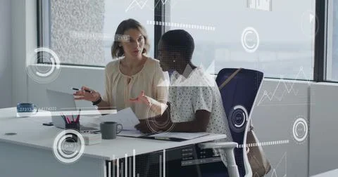 Image of icons and data processing over diverse business people in office Stockfoto's