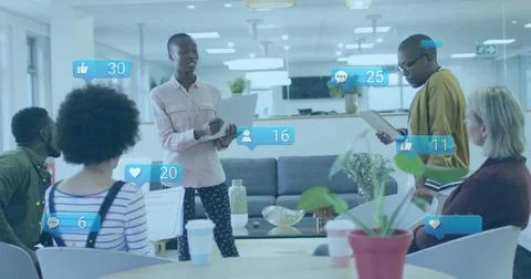 Image of icons and data processing over diverse business people in office Foto stock