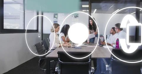 Image of icons and data processing over diverse business people working in 库存照片