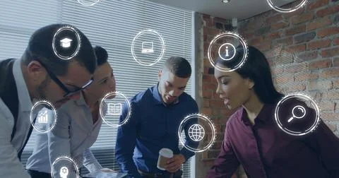 Image of icons and data processing over diverse business people in office 库存照片