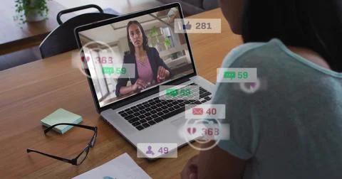 Image of icons and numbers over diverse business people using laptop in office Stock Illustration